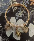 Green charm bracelet w gold
